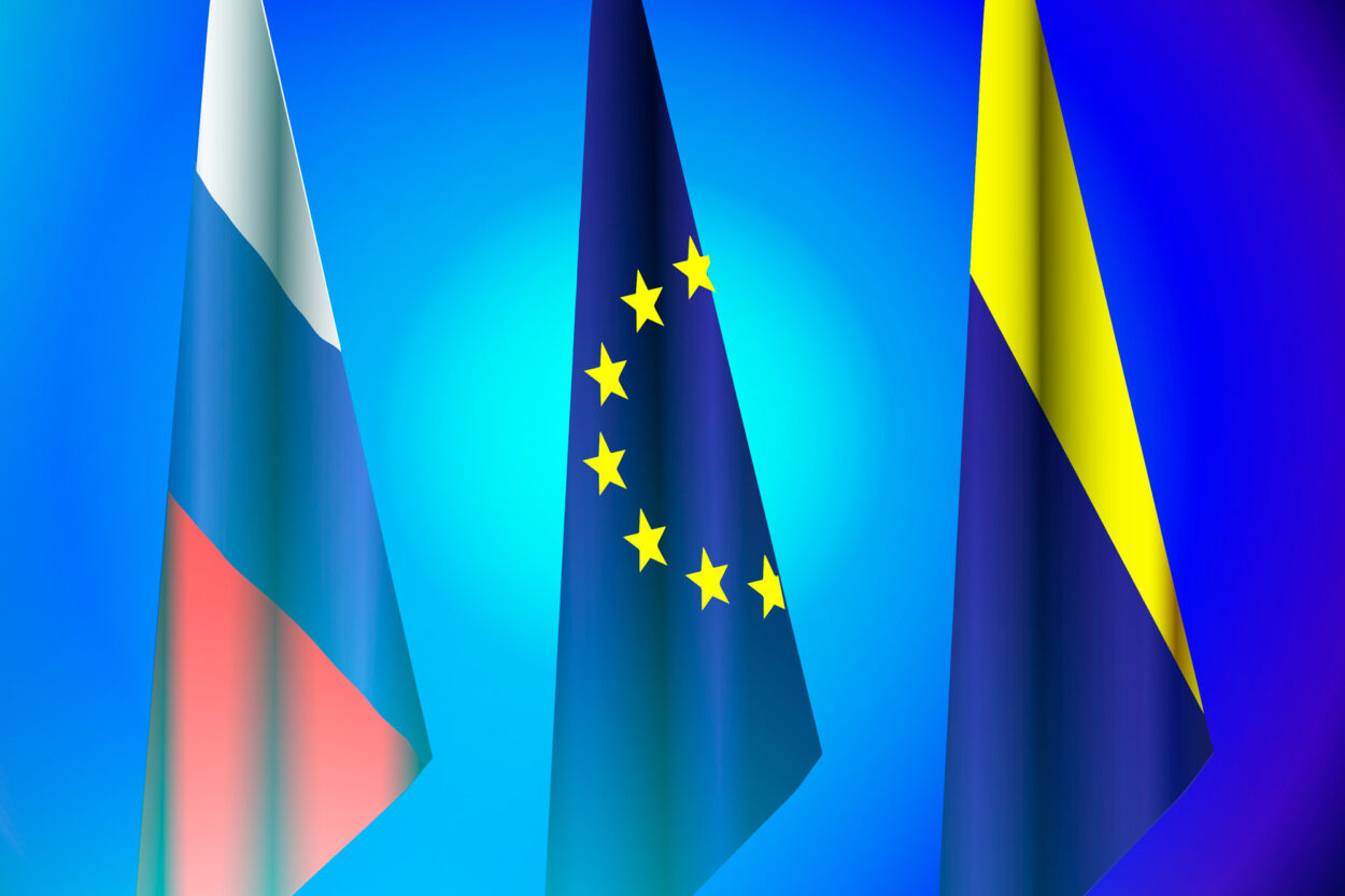 3 flags: Russia, the EU and the Ukraine.